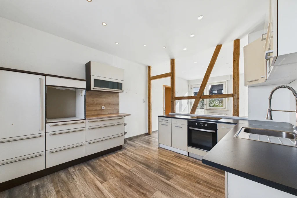 Immoprofis365 GmbH - Einfamilienhaus mit Garten und Kaminofen in Warstein–Belecke