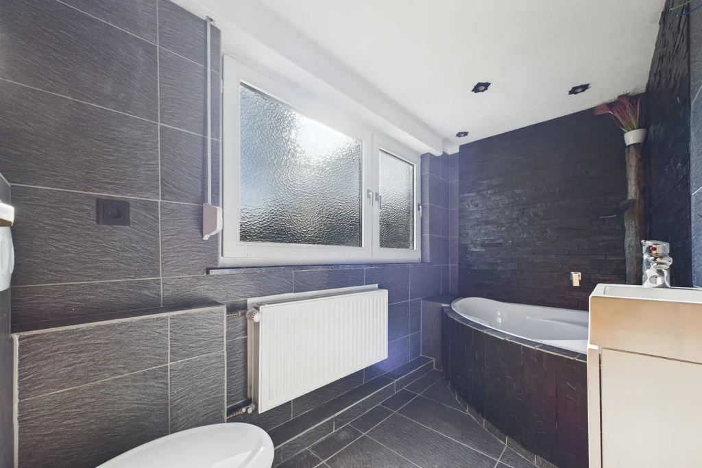 Immoprofis365 GmbH - Einfamilienhaus mit Garten und Kaminofen in Warstein–Belecke